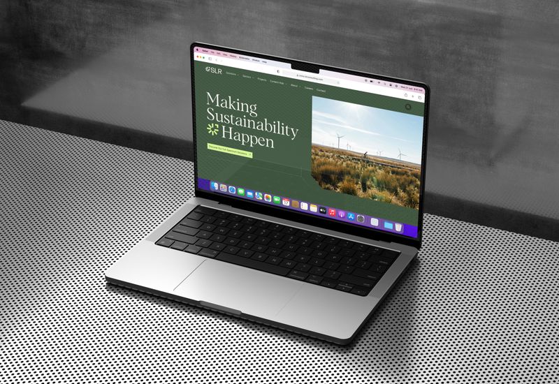 Website browser on Mac laptop with SLR website open